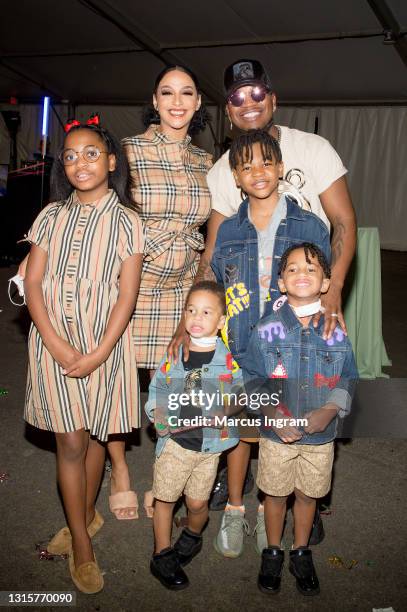 Madilyn Grace Smith, Crystal Smith, Ne-Yo, Roman Alexander-Raj Smith, Mason Evan Smith, and Shaffer Chimere Smith Jr. Attend the Foster The Funk...