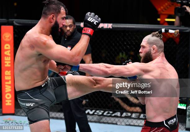 Dominick Reyes kicks Jiri Prochazka of the Czech Republic in a light heavyweight bout during the UFC Fight Night event at UFC APEX on May 01, 2021 in...