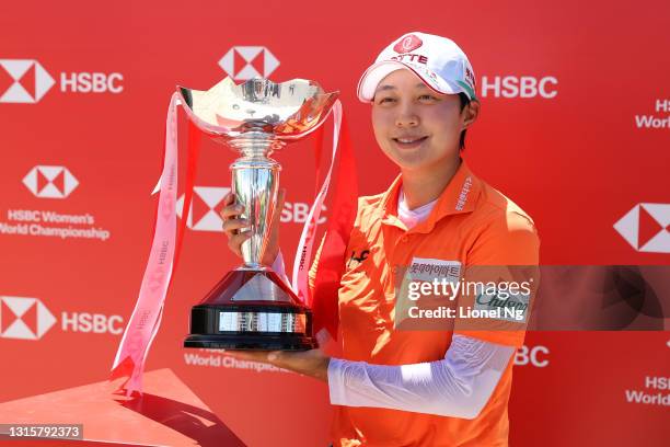 Hyo Joo Kim of South Korea poses with the trophy after winning the tournament following the final round of the HSBC Women's World Championship at...