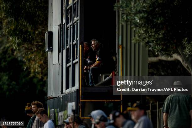 Man is seen sitting inside the old scoreboard during the round three VFL match between Sandringham and Box Hill at Trevor Barker Beach Oval on May...