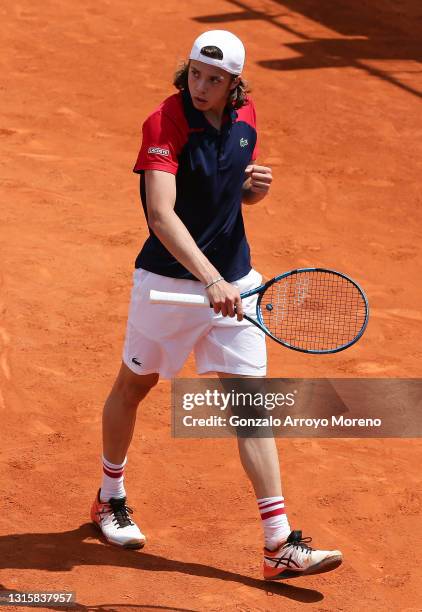 Arthur Cazaux of France celebrates during the first round match between Arthur Cazaux of France and Alexei Popyrin of Australia on day 4 of the on...