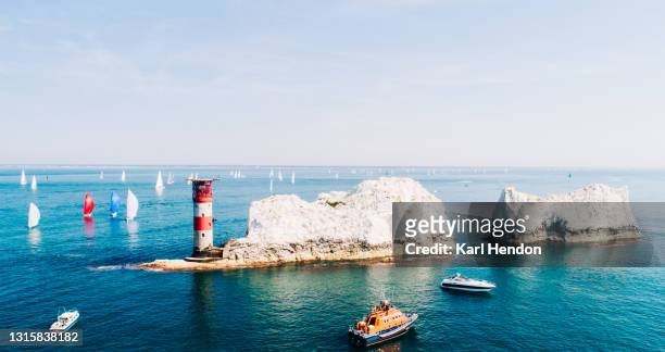 an aerial daytime view of the needles lighthouse, isle of wight - stock photo - isle of wight stock pictures, royalty-free photos & images
