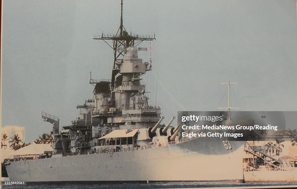WWII veteran Robert Saupee (88) served aboard the USS Missouri and was present at the Japanese Surrender aboard the ship in Tokyo Bay Sept. 2 1945. Copy photo of the Missouri. 8/25/15 photo by Tim Leedy