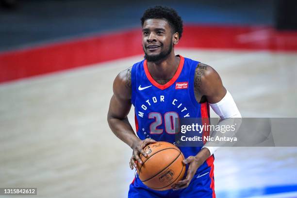 Josh Jackson of the Detroit Pistons shoots a free throw against the Dallas Mavericks during the third quarter of the NBA game at Little Caesars Arena...