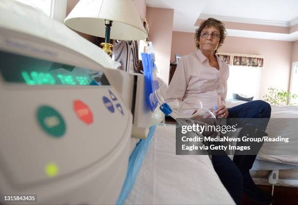 Robin Hivner in her bedroom with her peritoneal dialysis machine. She is hooked up to the machine while she sleeps. She is waiting for a kidney to...