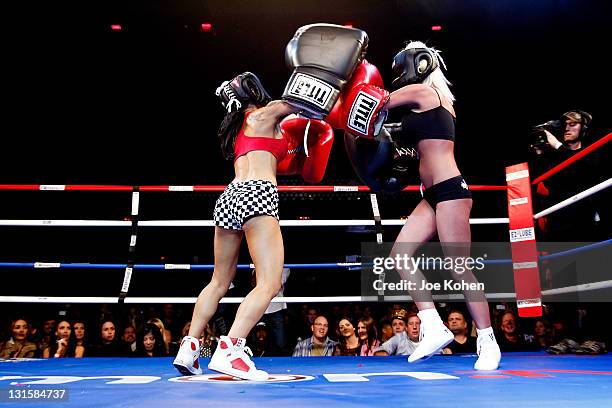 Personality Tila Tequila fights adult entertainer Cami Parker during "Celebrity Fight Night" At The Avalon on November 5, 2011 in Hollywood,...