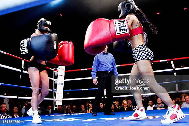 Personality Tila Tequila fights adult entertainer Cami Parker during "Celebrity Fight Night" At The Avalon on November 5, 2011 in Hollywood,...