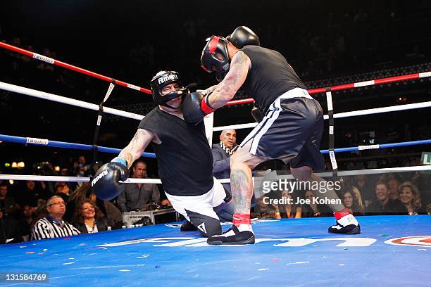 Radio personality Joey Buttafuoco fights Lou Ballera during "Celebrity Fight Night" At The Avalon on November 5, 2011 in Hollywood, California.