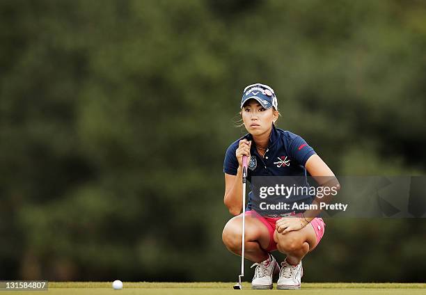 Momoko Ueda of Japan lines up her put on the 3rd playoff hole in the final round of the Mizuno Classic at Kintetsu Kashikojima Country Club on...