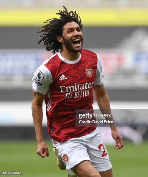 Mohamed Elneny celebrates scoring a goal for Arsenal during the Premier League match between Newcastle United and Arsenal at St. James Park on May...