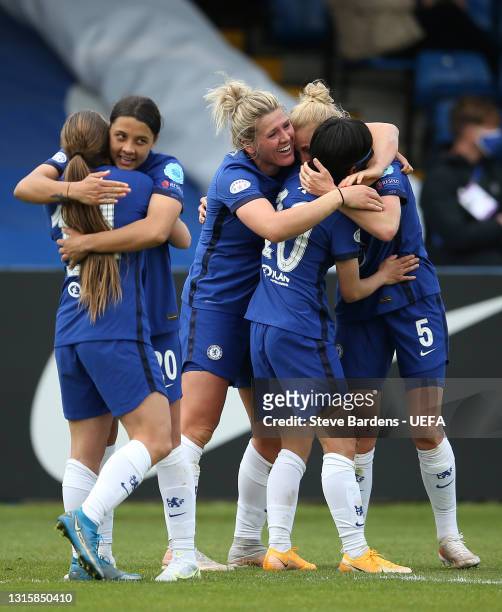 Millie Bright and Sam Kerr of Chelsea celebrate victory with team mates following the Second Leg of the UEFA Women's Champions League Semi Final...