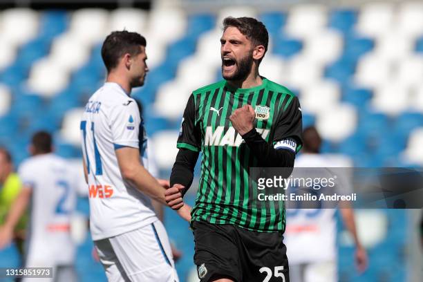 Domenico Berardi of U.S. Sassuolo Calcio celebrates after scoring their side's first goal from the penalty spot during the Serie A match between US...