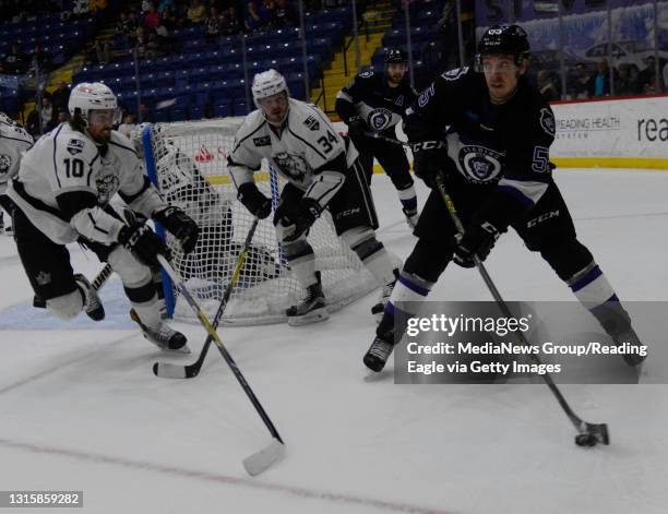 Reading forward Michael Huntebrinker skates with the puck past Manchester defenseman Tyler Elbrecht .Reading Royals lose 5-1 to the Manchester...