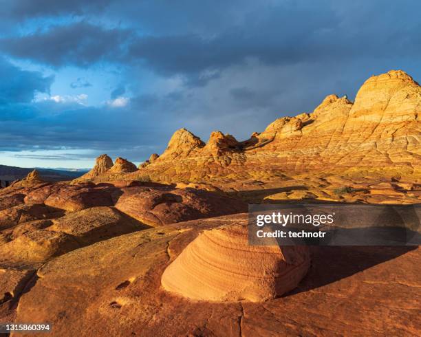 rock formations at coyote buttes south in arizona at sunset - the wave utah stock pictures, royalty-free photos & images