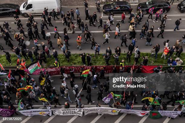 Demonstrators participating in the annual “Revolutionary May 1” leftist protest march on May Day during the third wave of the coronavirus pandemic on...