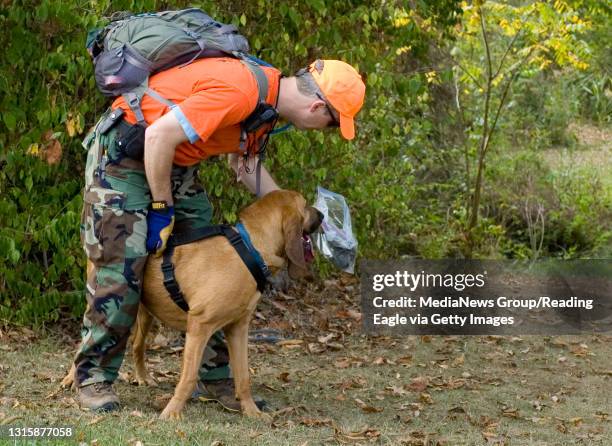 Photo by Lauren A. LittleOctober 6, 2007Middle Creek Search & RescueKevin J. Fleming of Denver, Lancaster County, lets his bloodhound, Lucy, get the...