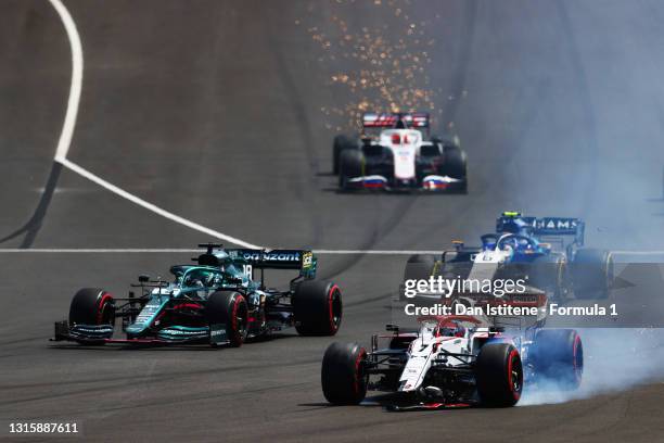 Kimi Raikkonen of Finland driving the Alfa Romeo Racing C41 Ferrari with a broken front wing during the F1 Grand Prix of Portugal at Autodromo...