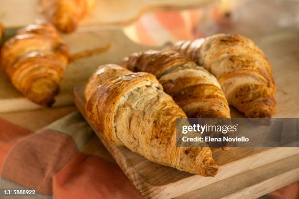 fresh italian cornetto croissants in the bakery. vegan croissant gluten free - brioche stock pictures, royalty-free photos & images