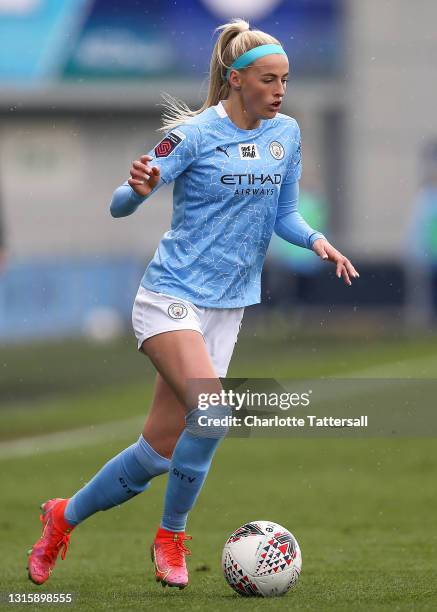 Chloe Kelly of Manchester City runs with the ball during the Barclays FA Women's Super League match between Manchester City Women and Birmingham City...