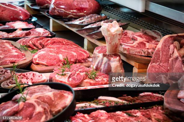 raw meats on butcher's shop. stock image - beef stock pictures, royalty-free photos & images