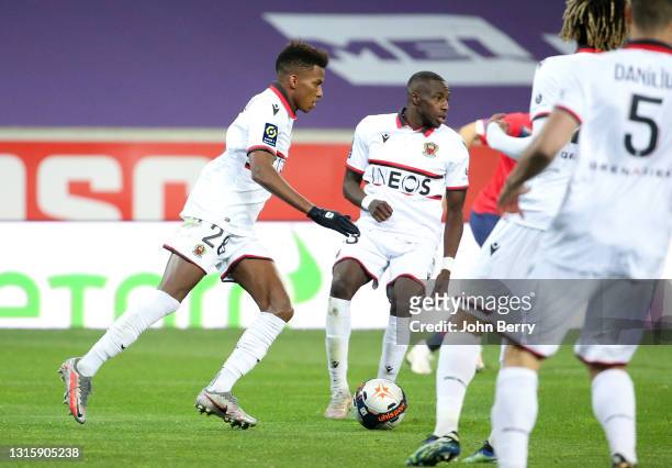 Hicham Boudaoui, Hassane Kamara of Nice during the Ligue 1 match between Lille OSC and OGC Nice at Stade Pierre Mauroy on May 1, 2021 in Villeneuve...