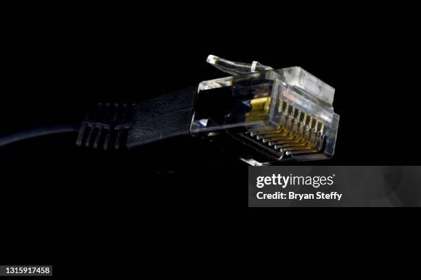 black ethernet connector - silver plug socket stock pictures, royalty-free photos & images