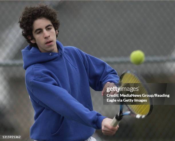 Photo by Krissy Krummenacker 200500772 Exeter's Sam Barrer during warm-ups Monday, March 21 at Wilson. Barrer is currently recovering from an injury...