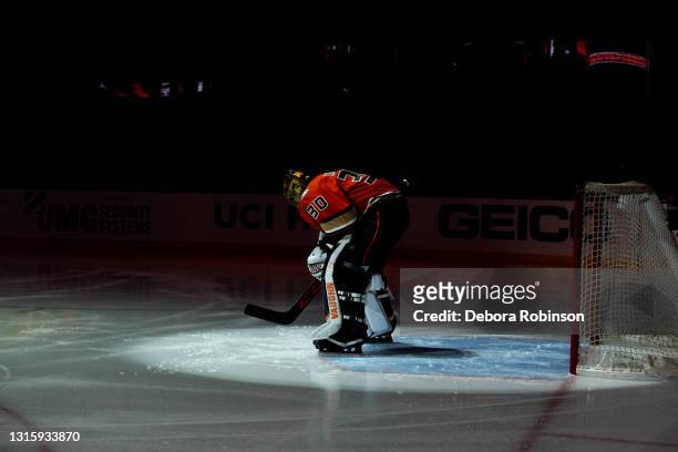 Goaltender Ryan Miller of the Anaheim Ducks takes a moment during lineup introductions before the game against the Los Angeles Kings at Honda Center...