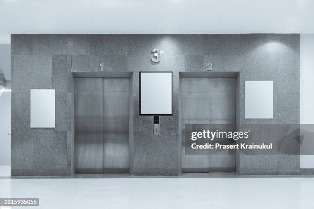 mock up blank banners display in modern building interior - metro mall stock-fotos und bilder