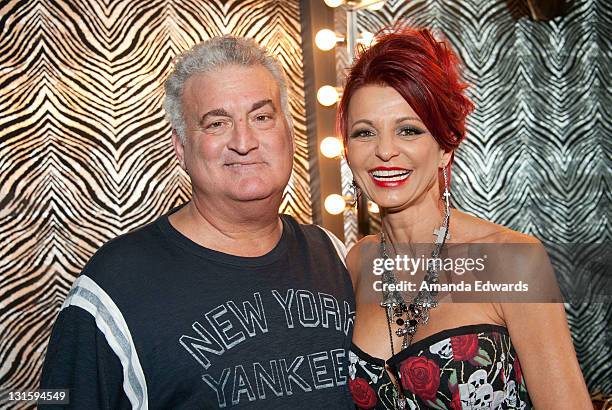 Radio personality Joey Buttafuoco and his wife Evanka pose backstage at the FilmOn "Celebrity Fight Night" at Avalon on November 5, 2011 in...