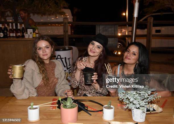 Emma Zander, Katie Breslin and Carmela Zumbado attend Vanessa Hudgens and Oliver Trevena Host 'Caliwater Escape' in Joshua Tree at the Mojave Moon...