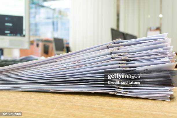 Paper Stacking Desk Photos and Premium High Res Pictures - Getty Images