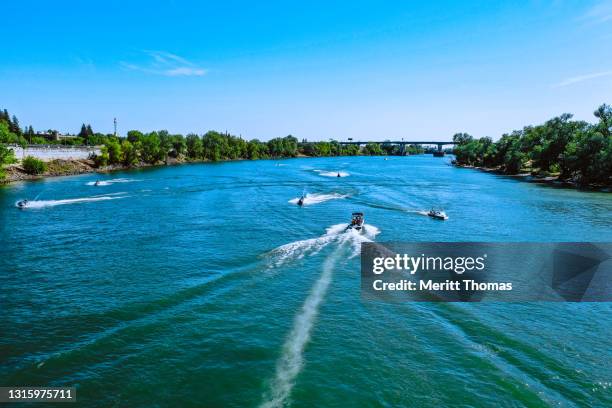 boats on the sacramento river - sacramento stock pictures, royalty-free photos & images