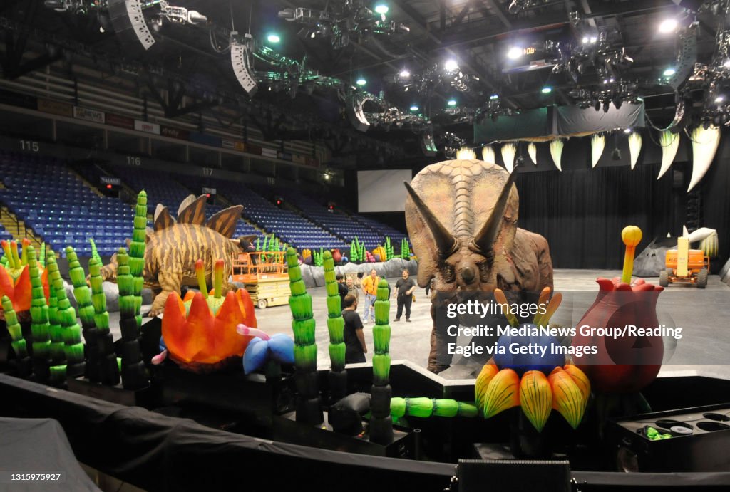 Walking With DinosaursInflatable prehistoric foilage rings the floor of the Sovereign Center as a 30-foot-long Torosaurus roams during a practice run Wednesday. Photo by Bill Uhrich 7/7/2010