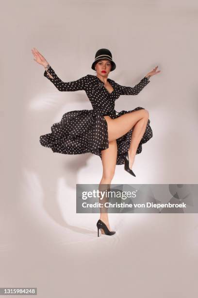 dancing woman long legs - leg show stock pictures, royalty-free photos & images