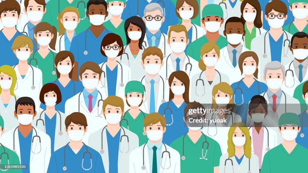 Grupo de profissionais de saúde com máscaras médicas.