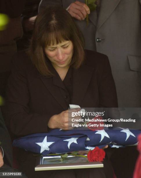 Jennifer's mother, Bernice Hartman, sobs during the funeral at Holy Saviour Cemetery in Bethlehem. Susan L. Angstadt 9-30-06