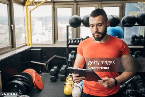 fitness instructor in gym - well structure stock pictures, royalty-free photos & images