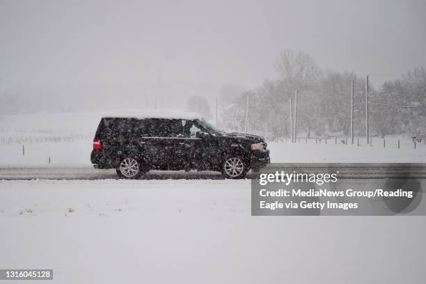 An S.U.V. Drives along Route 322 in Chester County on March 7, 2018. Photo by Natalie Kolb