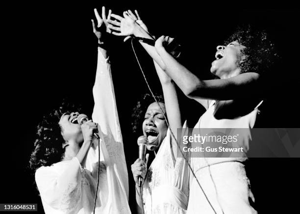 Joni, Kathy and Kim Sledge of Sister Sledge perform on stage at Hammersmith Odeon, England, on September 30th, 1979.