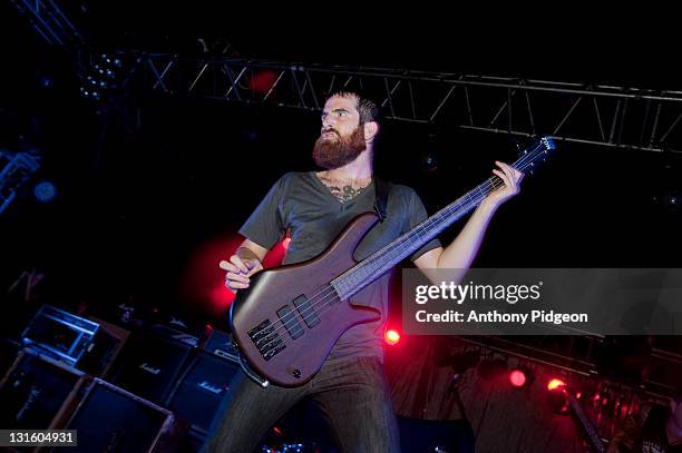 Liam Wilson of The Dillinger Escape Plan performs on stage at Roseland Theater on November 5, 2011 in Portland, Oregon.