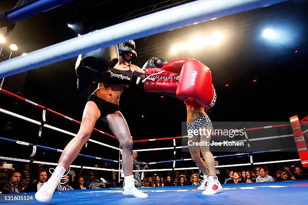 Personality Tila Tequila fight adult entertainer Cami Parker during "Celebrity Fight Night" At The Avalon on November 5, 2011 in Hollywood,...