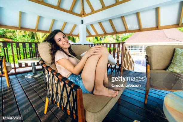 woman relaxing under gazebo on maldives - gazebo stock pictures, royalty-free photos & images