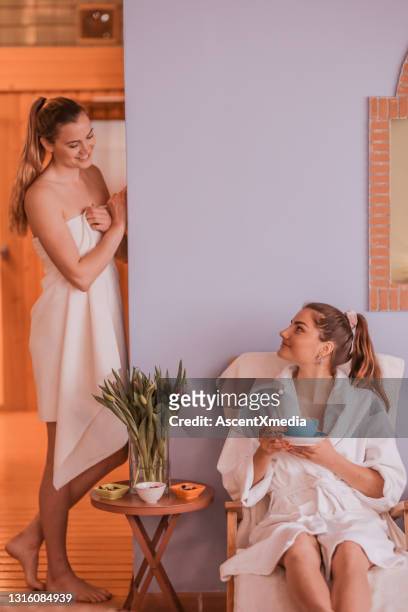 young women enjoy a snack at day spa - nuts magazine stock pictures, royalty-free photos & images