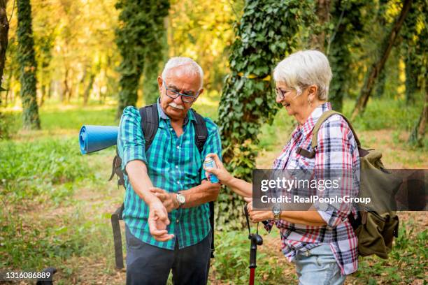 annoying mosquitoes - insect spray stock pictures, royalty-free photos & images