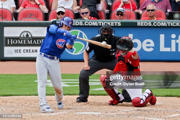 Tony Wolters of the Chicago Cubs flies out in the sixth inning against the Cincinnati Reds at Great American Ball Park on May 02, 2021 in Cincinnati,...