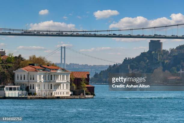 bosphorus strait in istanbul, turkey - istanbul bridge stock pictures, royalty-free photos & images