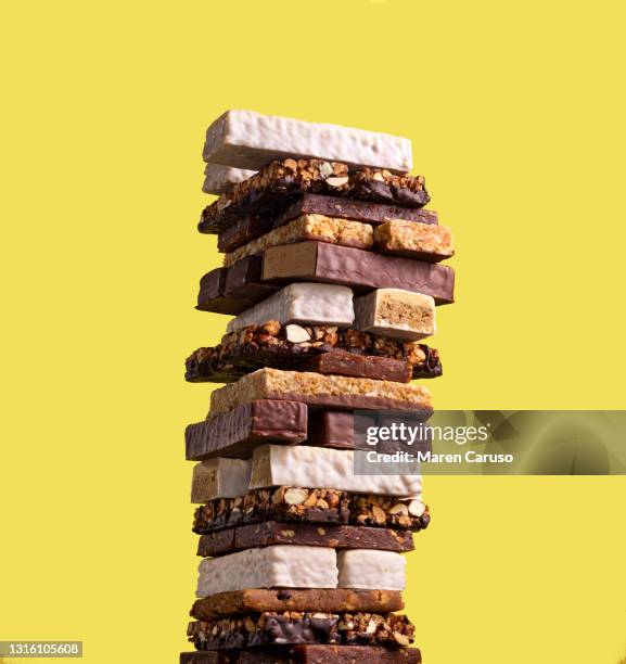 stack of protein health bars - muesli bar stock pictures, royalty-free photos & images