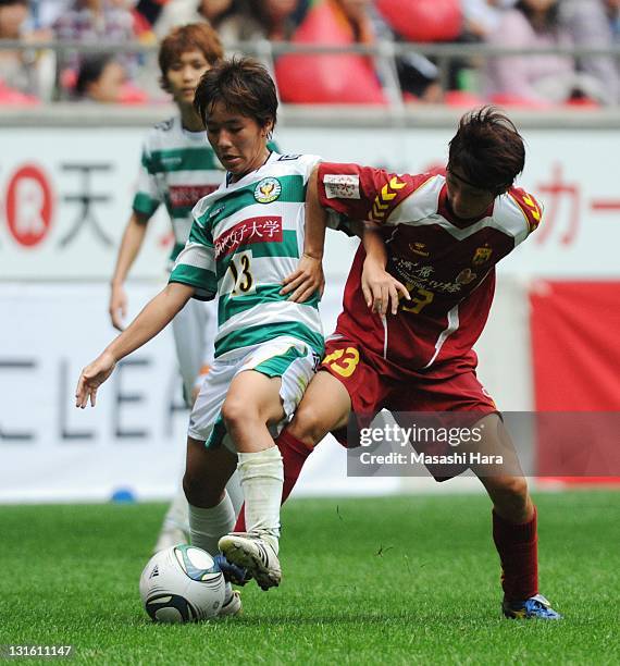 Mana Iwabuchi of NTV Beleza andChiaki Minamiyama of INAC Kobe Leonessa compete for the ball during the Nadeshiko League match between INAC Kobe...