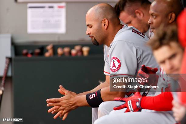 Albert Pujols of the Los Angeles Angels sits in the dugout during the game against the Seattle Mariners at T-Mobile Park on May 02, 2021 in Seattle,...